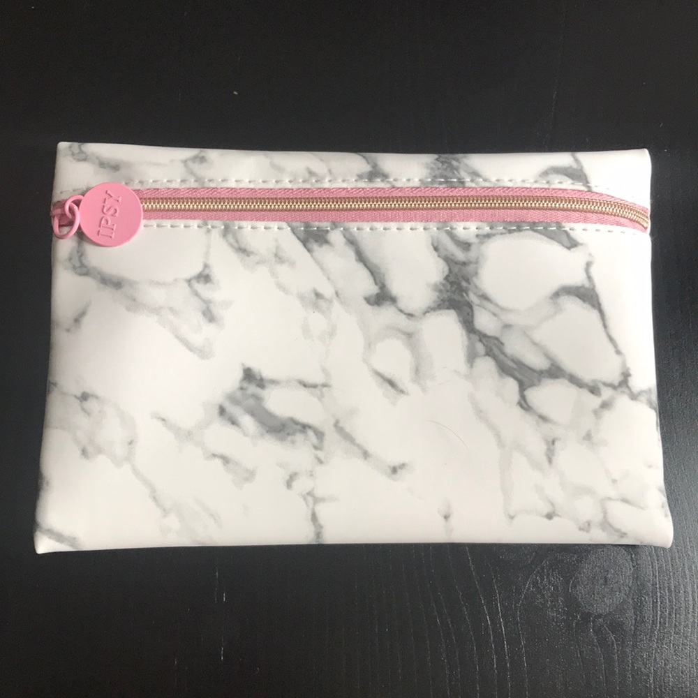 Ipsy marble pouch with pink interior